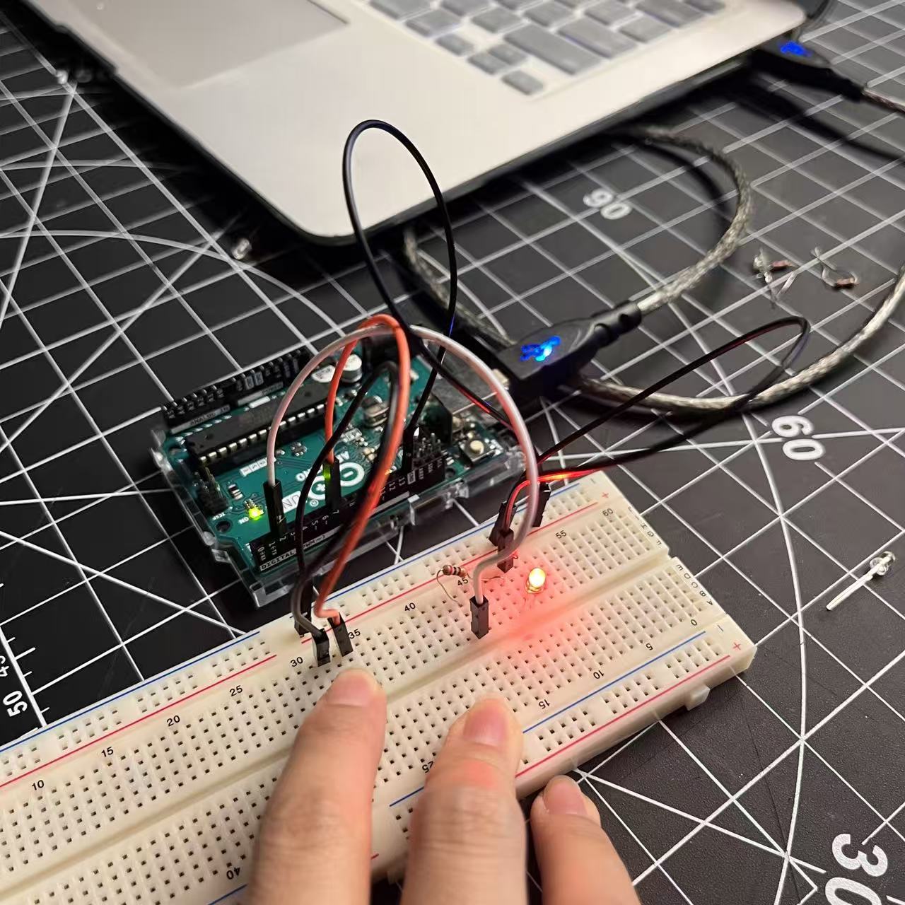 By pressing the button, I learned how input sensors can trigger light responses on the Arduino.